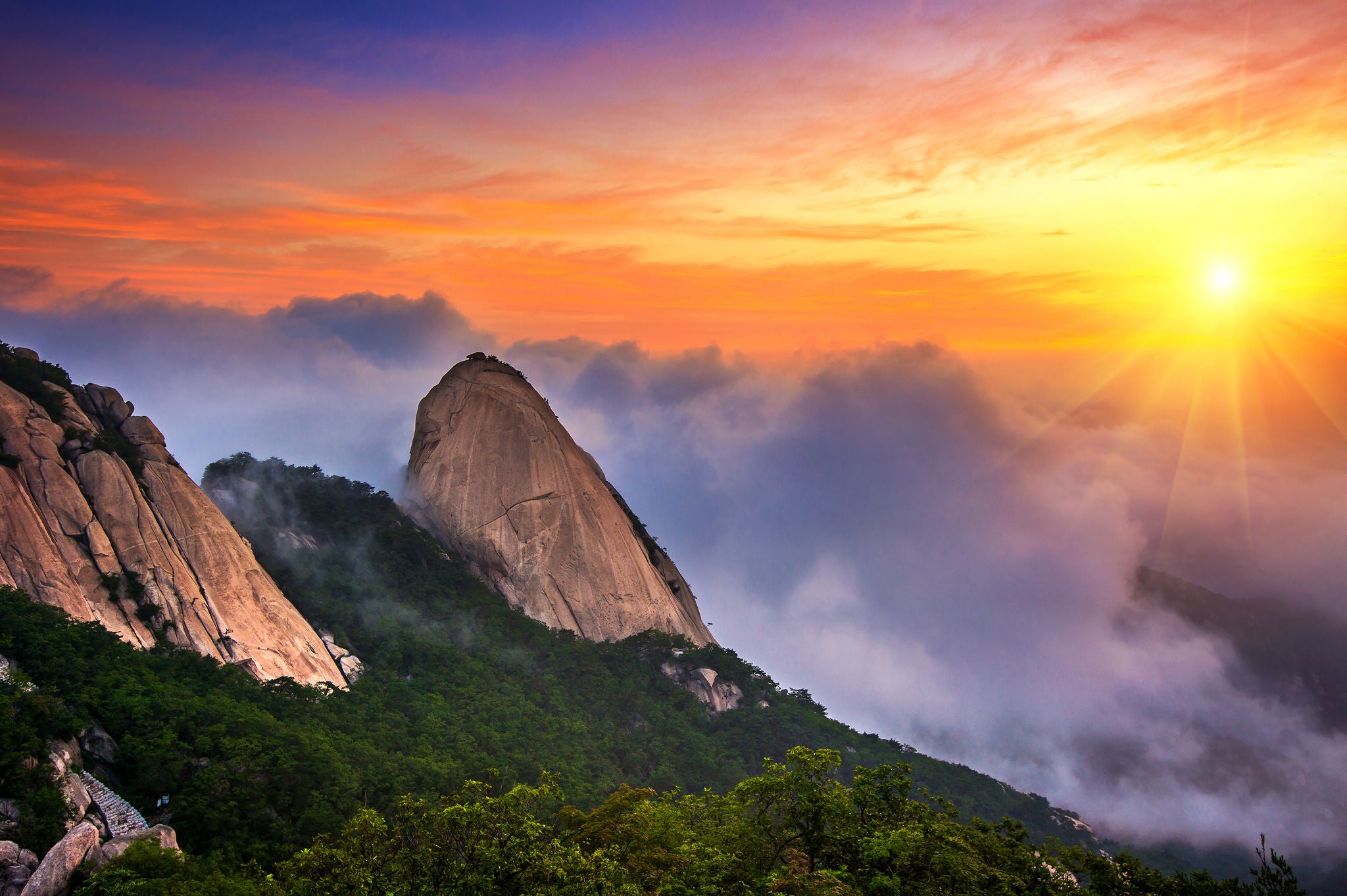 Bukhansan mountains is covered by morning fog and sunrise in Seoul,Korea, Bukhansan mountains is covered by morning fog and sunrise in Seo