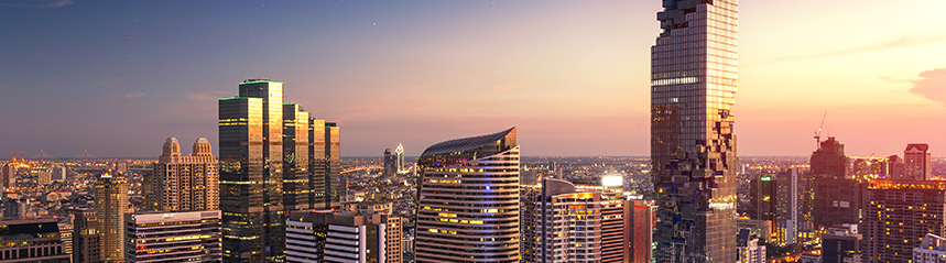 Aerial view of Bangkok modern office buildings, condominium in Bangkok city downtown with sunset sky , Bangkok , Thailand